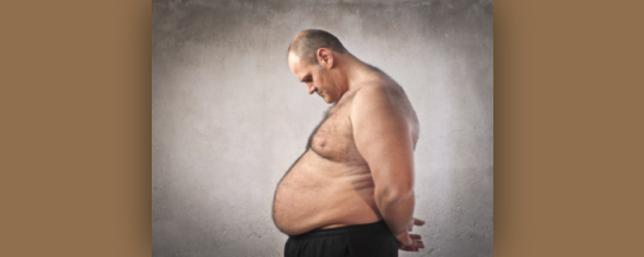 Photo of an obese man looking down, as if at a scale.