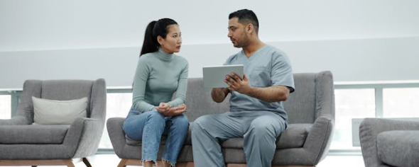 Doctor talking to patient.